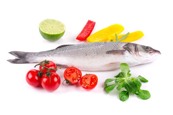 Fresh seabass with lemon and tomato — Stock Photo, Image