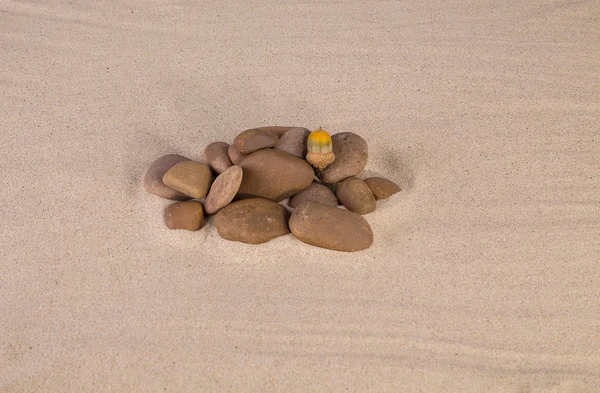 Heap of rocks on the sand. — Stock Photo, Image