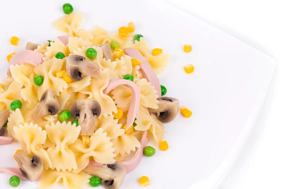 Pasta farfalle with ham and mushrooms. — Stock Photo, Image