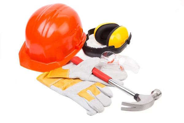 Red hard head, gloves and tools — Stock Photo, Image