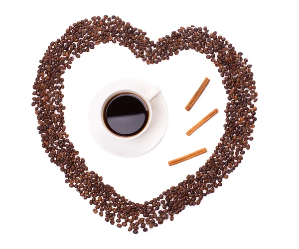 Copa de café en granos de café corazón — Foto de Stock