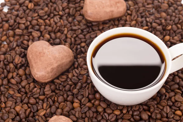 Sweets with cup of coffee — Stock Photo, Image