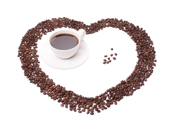 Granos con taza de café — Foto de Stock