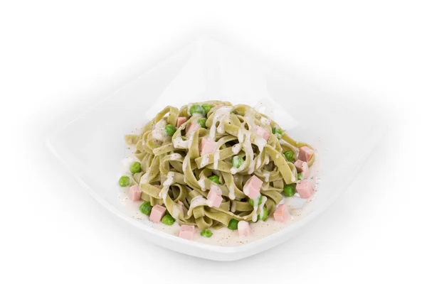 Pasta tagliatelle with green peas — Stock Photo, Image