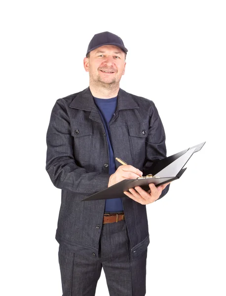 Trabajador escribiendo en carpeta . — Foto de Stock