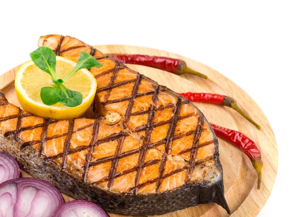 Salmon steaks on platter — Stock Photo, Image