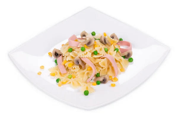 Pasta farfalle with ham and mushrooms. — Stock Photo, Image