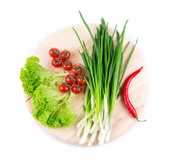 Cebola verde e tomate cereja — Fotografia de Stock