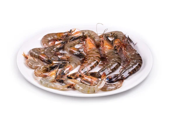 Raw shrimps on plate. — Stock Photo, Image