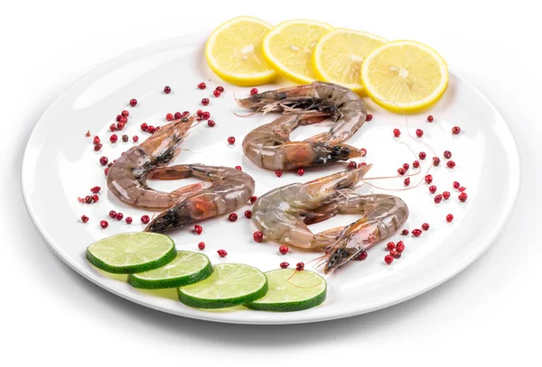 Raw tiger shrimps on plate — Stock Photo, Image