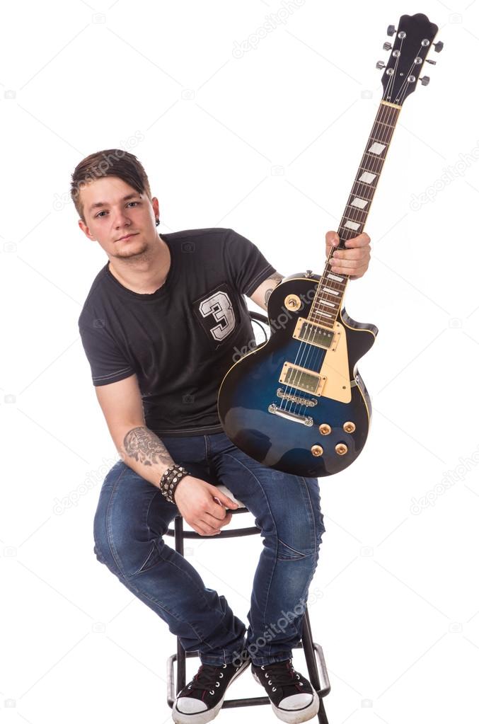 Lead guitarist holding guitar