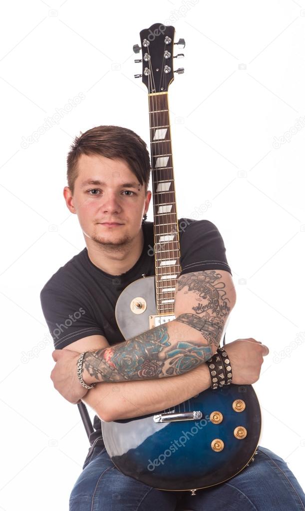 Lead guitarist holding guitar