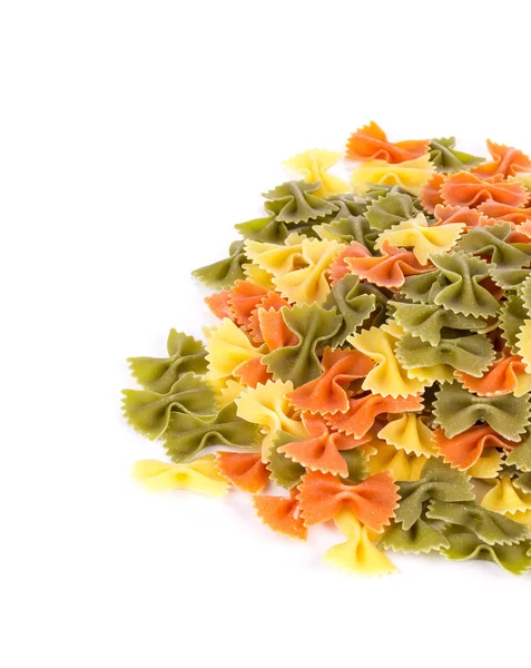 Bunch of the farfalle pasta three colors — Stock Photo, Image