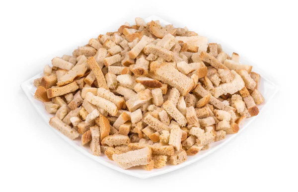 Croutons in een porseleinen plaat. — Stockfoto