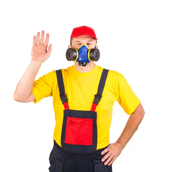 Pracovník v klobouku s respirátor. — Stock fotografie