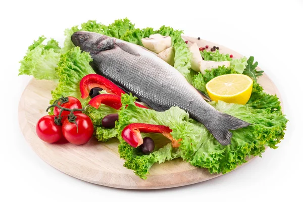 Composition of fresh seabass and vegetables. — Stock Photo, Image