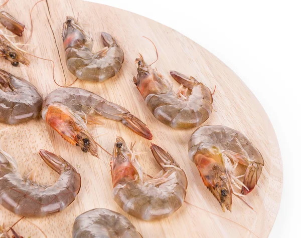 Crevettes fraîches sur carton rond . — Photo