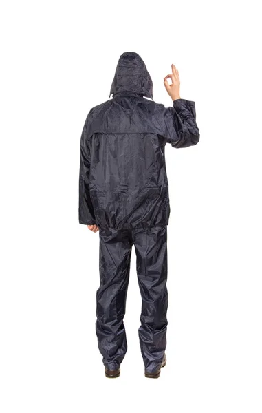 Man in black rain coat. — Stock Photo, Image