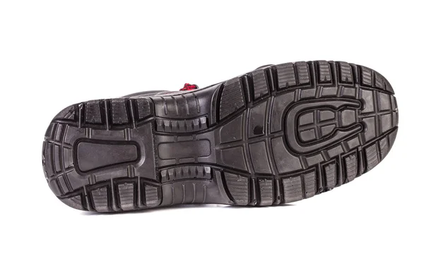 Detailní záběr černé boty podešev. — Stock fotografie