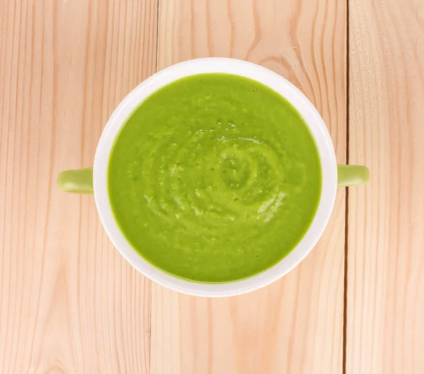 Broccoli cream soup on wood. — Stock Photo, Image