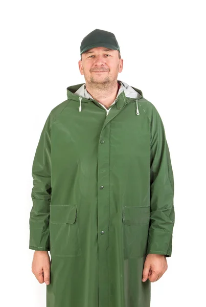 Homem de chuva casaco longo verde . — Fotografia de Stock