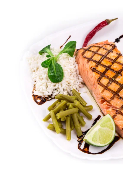 Roasted salmon fillets with rice. — Stock Photo, Image