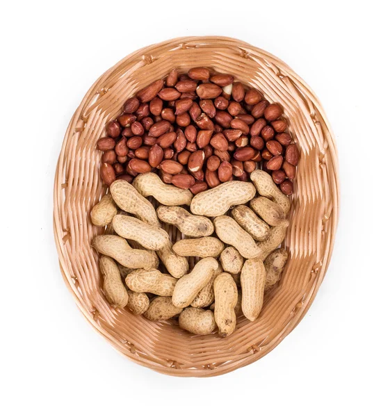 Wicker basket full of peanuts — Stock Photo, Image