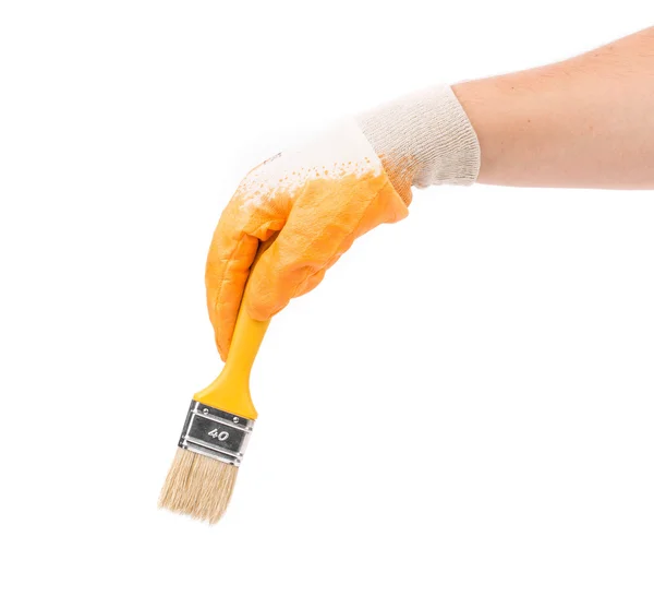 Hand with a brush. — Stock Photo, Image