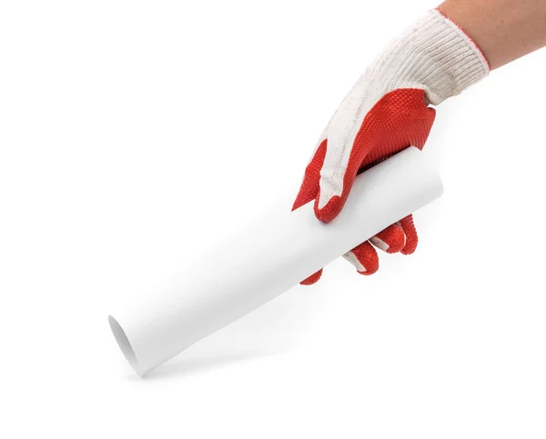 Hand in gray glove holding paper roll. — Stock Photo, Image