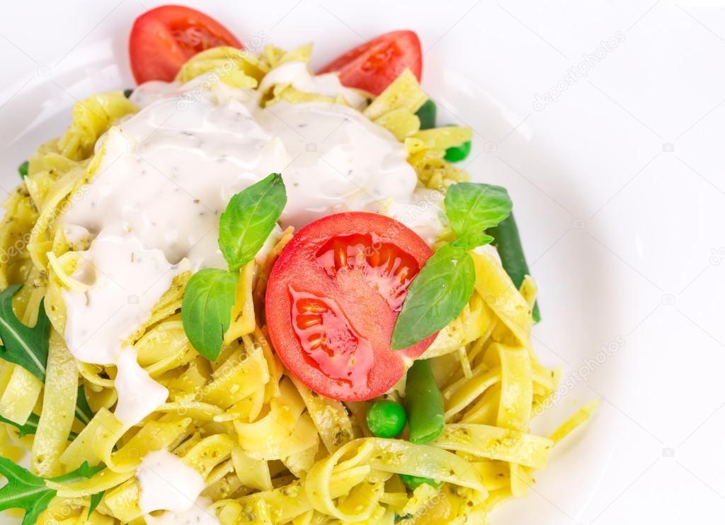 Tasty italian pasta with white sauce.