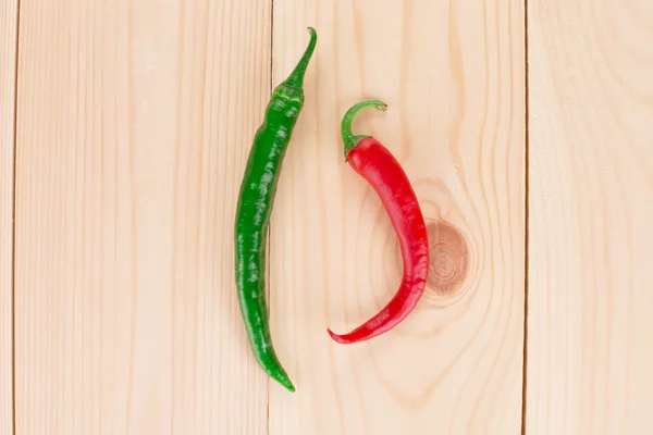Red and green   chili peppers — Stock Photo, Image