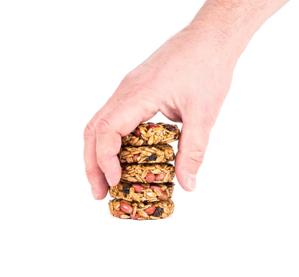 Candied seeds and nuts in hand. — Stock Photo, Image