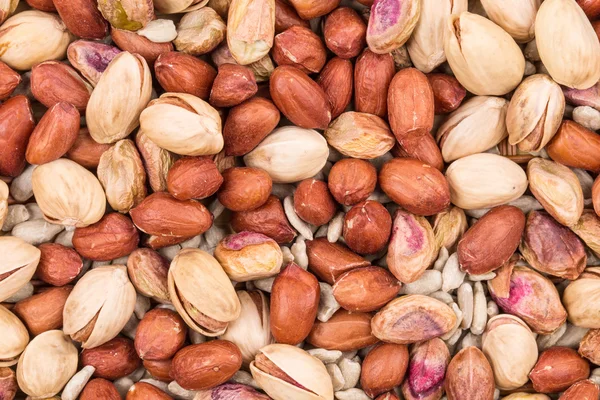 Pistachios with peanuts and sunflower seeds. — Stock Photo, Image