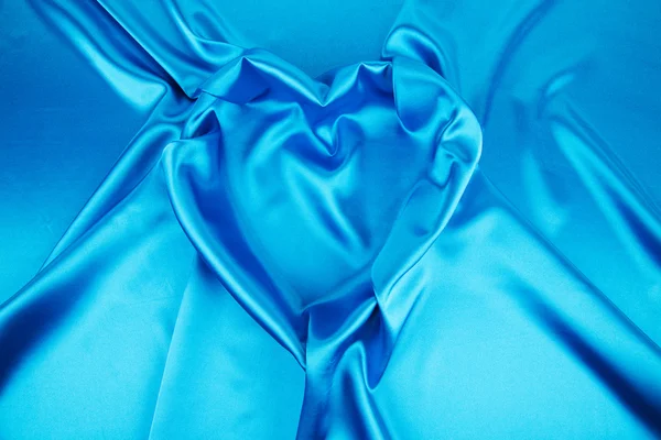 Blue silk heart  drapery — Stock Photo, Image