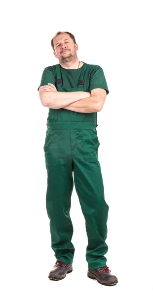 Worker in green overalls — Stock Photo, Image