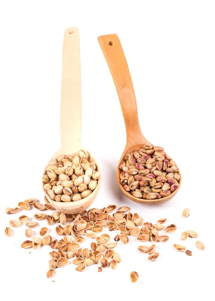 Spoons with pistachios — Stock Photo, Image