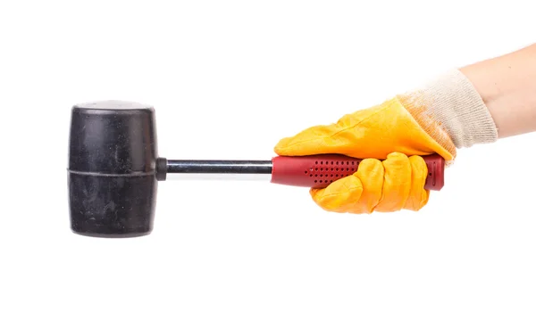 Mão segurando martelo de borracha — Fotografia de Stock