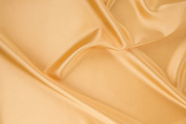 Golden silk drapery. — Stock Photo, Image