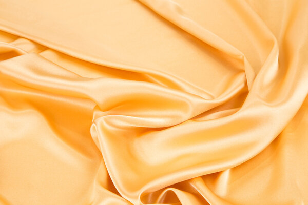 Фактура желтой ткани крупным планом
.