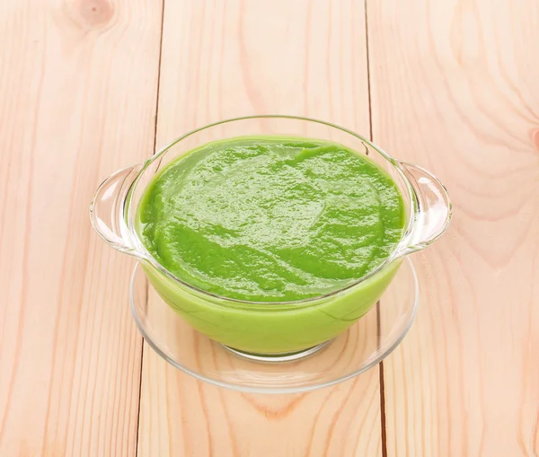 Broccoli cream soup on wood. — Stock Photo, Image