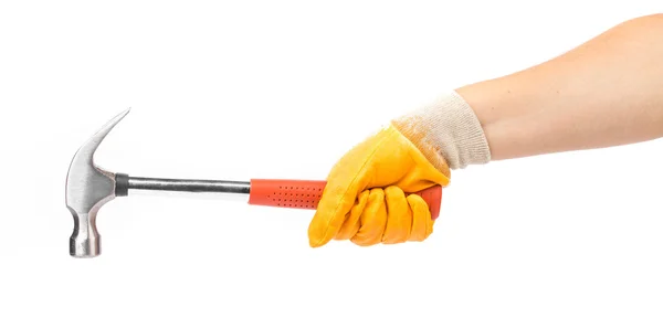 Mano de hombre en guante sosteniendo martillo . — Foto de Stock