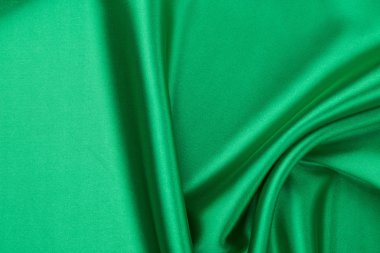 Yeşil ipek dokusuna yakın çekim.