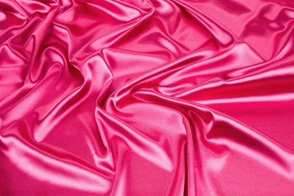 Primer plano de textura de seda rosa — Foto de Stock