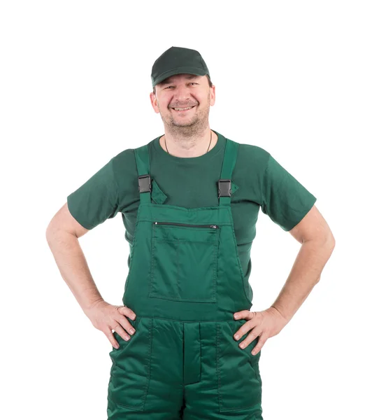 Werknemer in groene overalls. — Stockfoto