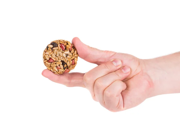 Candied roasted peanuts seeds in hand. — Stock Photo, Image