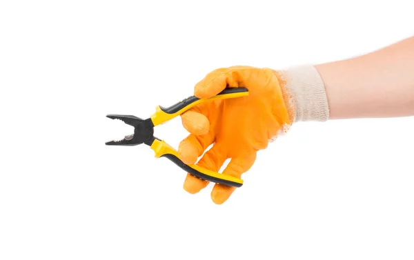 Hand in glove holding pliers. — Stock Photo, Image