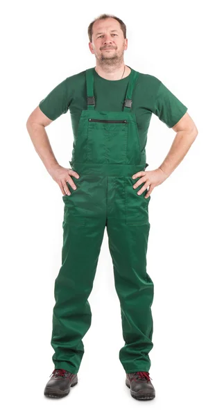 Worker in green overalls. — Stock Photo, Image