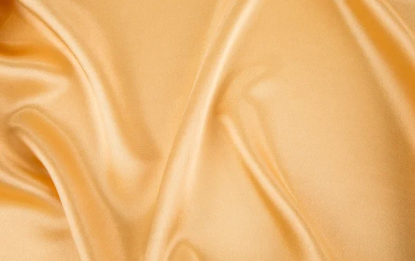 Golden silk drapery. — Stock Photo, Image