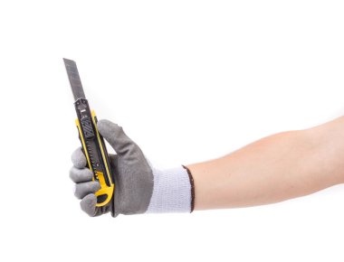 Hand in gloves holding knife. clipart