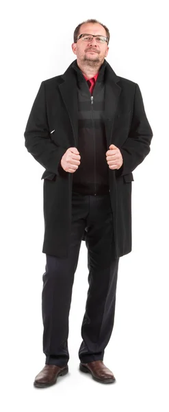 Muž v dlouhém černém kabátě. — Stock fotografie